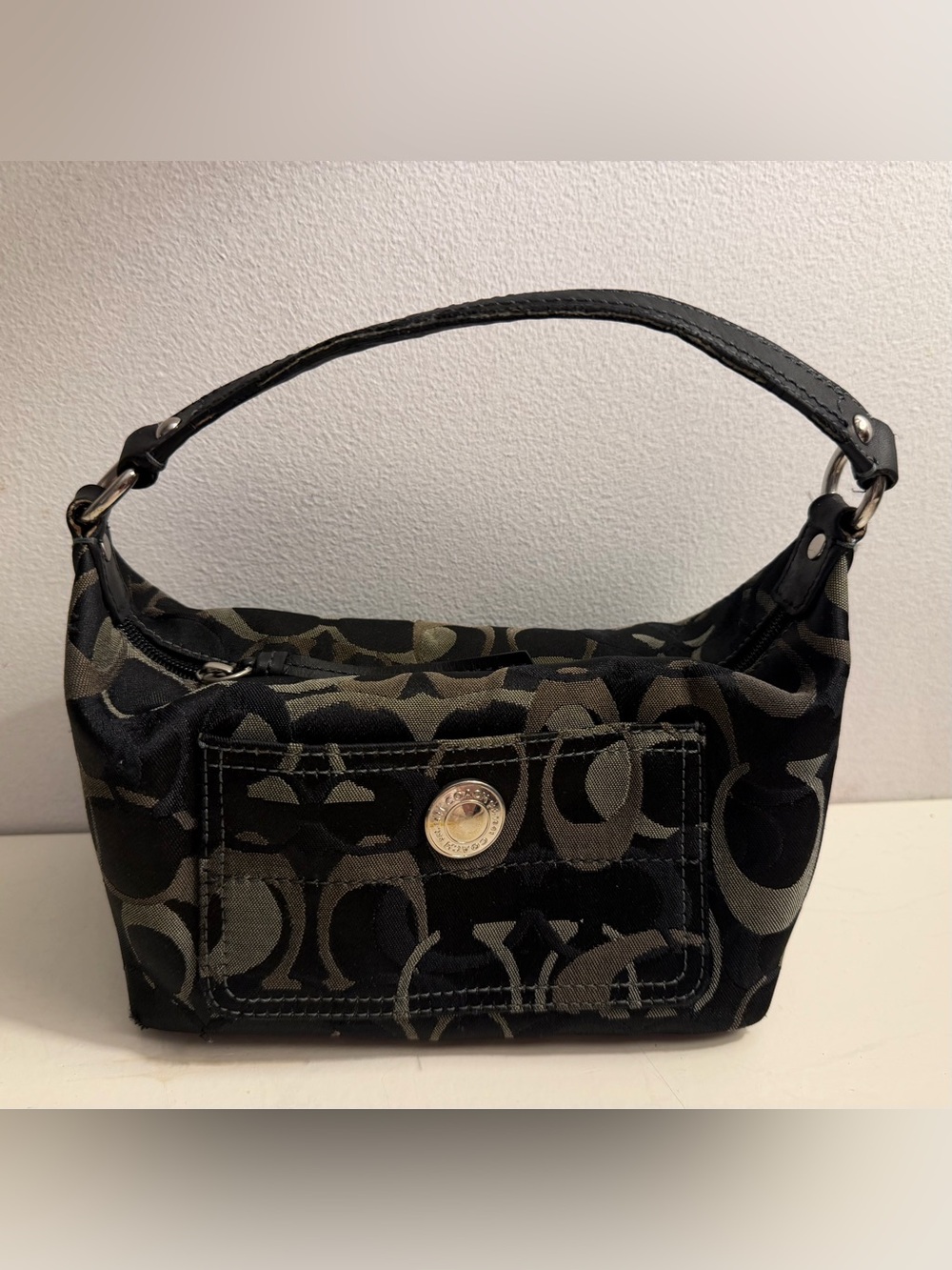 Coach mini Chelsea Optic Signature bag.